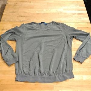 Women's gray long sleeve sheer cut out shirt.